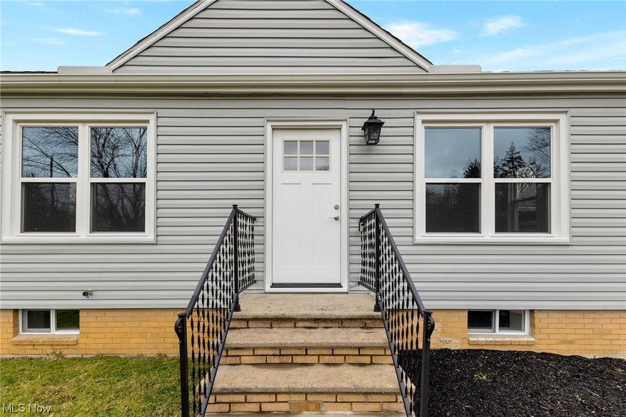 This turn-key 2 Bed/2 Bath Ranch in North Royalton exudes modern comfort. The updated kitchen boasts granite counters, luxurious vinyl floors, and brand-new high-end stainless-steel appliances, including an LG gas stove & ThinQ French Door refrigerator. Hardwood floors grace the bedrooms and living room, enhancing the home's timeless charm. The main floor features a tastefully remodeled bathroom with a walk-in shower and vanity for added convenience. The finished basement expands the living space, offering a family room with upscale vinyl floors, a versatile spare room, and an oversized custom bathroom with a granite vanity and tile floors. The lower level also includes a large unfinished section, ideal for a laundry area, ample storage, or a workshop for the handy person. Step into the outdoors to enjoy the expansive backyard, surrounded by majestic tall pine trees that provide a sense of privacy, creating an ideal setting for entertaining. A one-car garage, complemented by a covered breezeway, adds a touch of convenience to the home's layout. The freshly paved driveway, along with updates such as Vinyl Siding, Plumbing, Electrical box, fresh paint, and newer windows, enhances the property's overall appeal. New Roof, Dec 2023! Don't miss the chance to make this your home sweet home—schedule your private showing now!