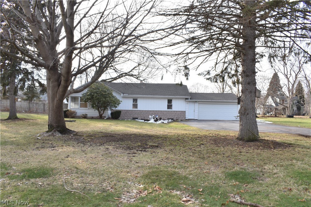 A long driveway leads you back to a beautiful ranch style 3 bedroom 1 bath home at 156 Lee Rd. Nothing to do here but move in & start enjoying! The interior has been remodeled, restructured, & insulated. This home has a nice layout with a covered front sun-room shaded by the landscaping that leads you into the large living room with original hardwood floors. No space is wasted here - there's even a large dining area open to the kitchen! The kitchen is all newer including cabinets, counter-tops, back splash, stove, microwave, and vinyl plank flooring. The bathroom has also been updated and there's a laundry hookup on the first floor for convenience. All 3 bedrooms are nicely sized with newer carpet, paint, and fixtures. The partial basement is accessible from the back exterior of the home & is great for added storage space with its own entrance. The 2 car garage has an automatic electric door opener (no entry directly from garage into house although attached, have to still use front or