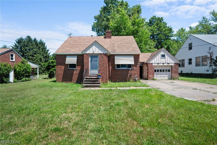 This South Euclid brick bungalow presents a wonderful chance to revive its original charm, nestled on an expansive almost 1-acre lot close to various amenities, making the location ideal. With two bedrooms downstairs and one upstairs, this property could serve as an ideal starter home for someone, boasting a rare large lot. Inside, the hardwood floors are ready to be refinished, restoring their former shine. The generous backyard offers plenty of space for outdoor activities or potential expansion. The area has easy access to schools, shopping, and parks. By renovating this bungalow, you could create a cozy modern retreat while maintaining its timeless allure. This property provides a distinctive opportunity for those seeking to personalize a home in a great area with a huge yard. The home needs a lot of love but it would be well worth it.