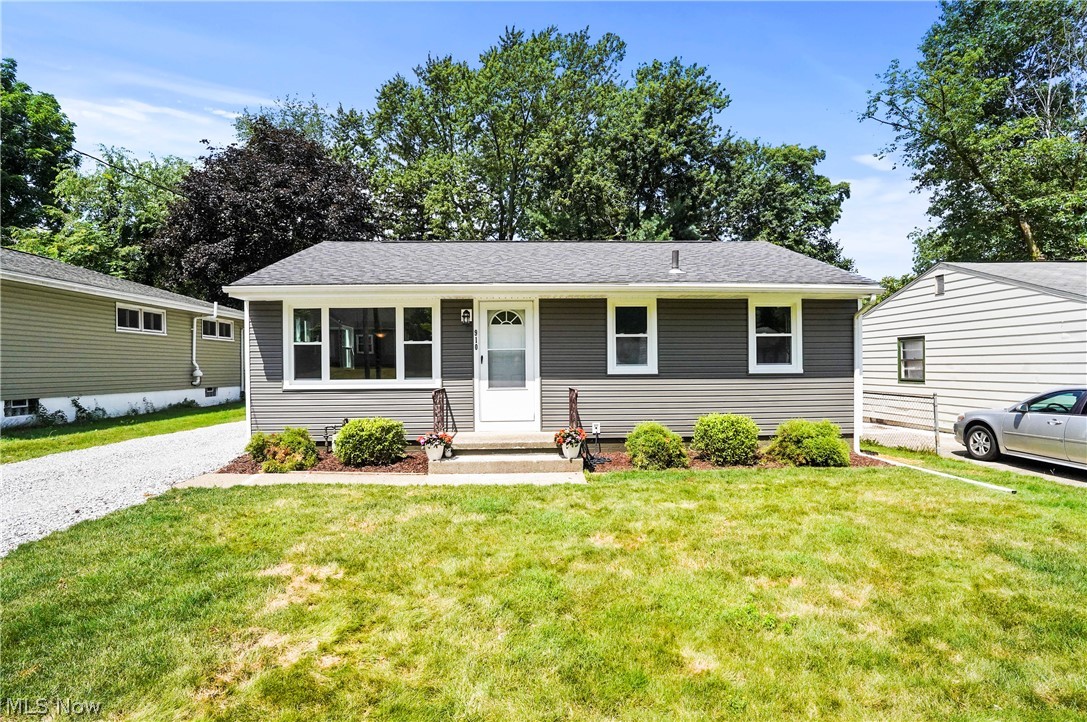 Welcome to 910 Manitou Ave, a beautifully updated Ranch home in Akron! This charming 3-bedroom, 1.5-bathroom residence offers 952 sq ft of comfortable living space and a partially finished basement for extra room. The exterior boasts brand-new siding and windows, while the roof was replaced in 2016, ensuring peace of mind for years to come. Enjoy the convenience of a brand-new hot water tank as well. Step inside to an open floor plan that seamlessly connects the family room to the kitchen. The kitchen is a chef’s delight with new cabinets, countertops, backsplash, and flooring. The entire home features new carpeting, enhancing its cozy ambiance. Both bathrooms have been tastefully redone. Outside, you'll find a detached 2-car garage providing ample storage and parking. This home is a perfect blend of style and function, ready for you to move in and make it your own. Don’t miss this opportunity to own a meticulously updated home in a great location!