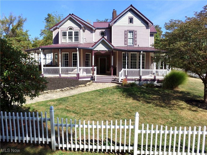 Step into timeless elegance with this beautifully updated 4 bedroom, 3 bath Victorian style home that blends historic character with today's modern comforts. A welcoming wrap around porch sets the tone, perfect for morning coffee or evening gatherings. Inside you'll find 12' soaring ceilings, sun filled rooms and original architectural details thoughtfully preserved. The spacious living areas flow seamlessly, while the modernized eat-in kitchen offers an open design flooded with natural light & sliding glass doors leading you to the spacious deck and pool area. Retreat to the Master bedroom on the second level complete with a jacuzzi tub & walk-in closet. This spacious home offers the convenience of a main level bedroom & laundry hook ups. Sitting on an acre of land with a 2 car detached garage, 2 sheds, and a poolhouse, storage will never be a concern. Whether you're enjoying evenings on the porch, creating memories in the spacious yard or simply soaking up the charm of every detail, this home is more than a place to live... it's all heart.