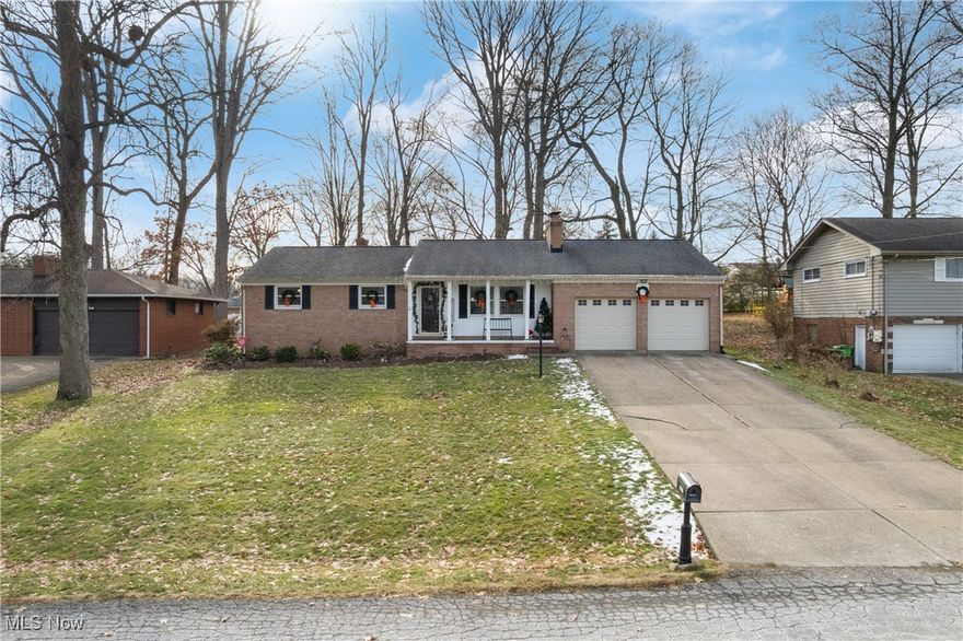 Experience the pride of ownership in this meticulously updated Perry ranch, where charm seamlessly blends with modern comfort. Enter this inviting open floor plan, where warm LVT flooring and a cozy wood-burning fireplace set the stage for a welcoming ambiance. The heart of this home is the newly renovated kitchen, a culinary delight featuring recessed lighting, plentiful cabinetry with a pantry, and stunning quartz countertops that extend into a massive island—perfect for gatherings. A stylish tile backsplash, farmhouse sink, and sleek stainless steel appliances complete this beautifully designed open space, making it ideal for both cooking and entertaining. This delightful residence offers three generously sized bedrooms on the main floor. The second and third bedrooms showcase original hardwood flooring, while the primary suite features cozy carpet for added comfort. The updated bathroom includes a large granite vanity and a tub/shower combo, adding a touch of luxury. Moving to the partially finished basement, you'll discover an inviting rec room complete with a second wood-burning fireplace and a bar area, creating the perfect setting for entertaining guests. Additional conveniences in the basement include a second bathroom, the laundry area, and ample storage. The recently tiled three-season room provides a peaceful view of the private backyard and patio space, ideal for outdoor gatherings and featuring a custom brick storage shed for your lawn and gardening tools. Other notable upgrades throughout the home include: windows, roof, furnace, and A/C installed in 2016, along with a hot water tank that was replaced in 2021. Completing this exceptional property is the cement driveway leading to a convenient two-car attached garage and a charming covered front porch. This property is not just a house; it’s a place you will be proud to call home! Whether you're moving up or downsizing, this wonderfully maintained residence is a rare find that won't last long!