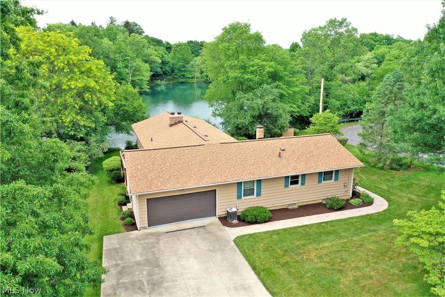 Welcome to this darling ranch in Cuyahoga Falls on Marian Lake! This hidden gem is on a corner lot of a quaint street! A walk out lower level for you to take in that STUNNING view of Marian Lake in your backyard! Three nicely sized bedrooms and 2.5 baths. Roof is 2 years old and windows are 5 years old. Check this one out today!