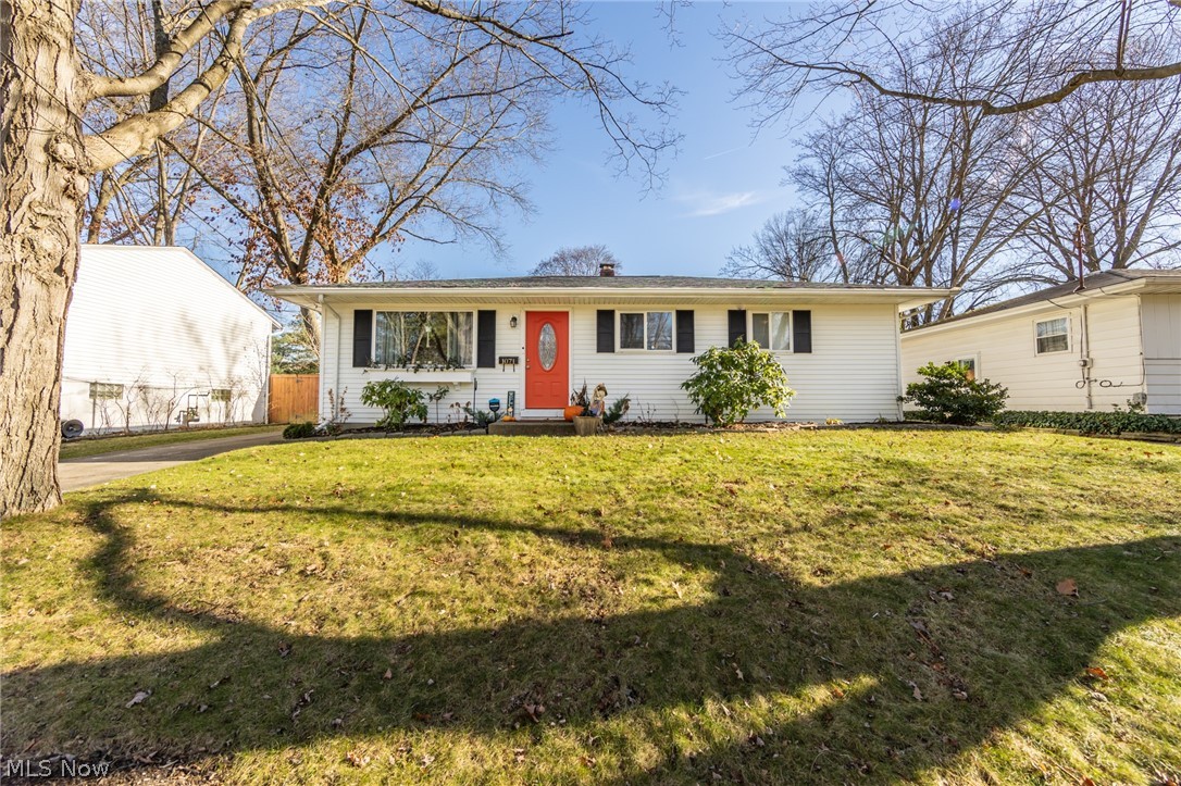 Welcome to this darling ranch in West Akron! Step inside to the family room with a large window to allow the natural light to shine on the beautiful flooring. Off the family room is the kitchen that has lovely soft close cabinets with granite counter tops and subway tile backsplash. Off the dining area, there are french doors leading to the deck, which is the perfect spot for gathering in the summer and spring. Three nicely sized bedrooms, all on the main floor, which is one floor living at its finest! The basement is currently set up as a workout room and rec room with a full bathroom! Large backyard that is fenced in. Do not miss out on this home in West Akron!
