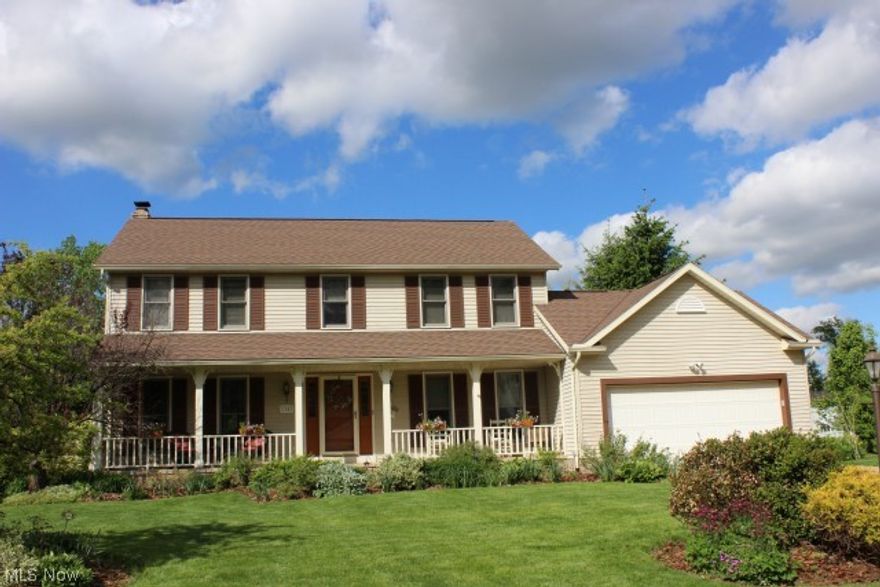 Pretty & spacious 4 bedroom, 2.5 bath Colonial w/approx 2492SF incl finished rec room* Absolute move in* Neutral decor thru out situated on a pretty & serene .6 acre lot w/2 parks, 2 tier deck w/built in seating, Pergola & brick patio* Living room/office* Formal dining room w/crown molding & chair rail* Foyer w/oak floor & crown molding* 1st floor family room w/brick wood burning fireplace & large bay window* Bayed applianced kitchen w/ceramic floor* Breakfast rm w/ceramic floor & slider to deck* 1st floor laundry w/utility sink, large closet & ceramic floor* Master bedroom w/fan & walk out closet* Bath w/double vanity, garden tub, separate shower & sky light* 3 bedrooms w/new carpet (5/2014)* Rec room w/new carpet (5/2014)* Water softener (5/2014)* Shingles 30 yr, single layer (2009)* Updated lighting* H2O approx 4 yrs.* 2 car attached garage* Extra parking pad* Concrete front porch* Gas budget $57.00/mo.* 2 ponds w/pumps*Home Warranty*