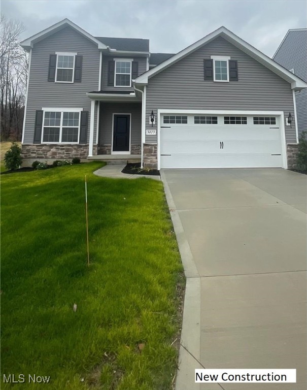 This beautiful home is located in Green, Ohio. You can access I-77 in just a few minutes. Very close to shopping and all of the restaurants that Green has to offer. Forest Lakes has a pavilion with open space for gatherings. There is a walking trail behind the homes. The Irving floor plan has 3 bedrooms and 3.5 baths. We added a composite deck to enjoy the spring and summer days. You must see this home as it will not last. Home will be completed in mid September. Ask us about our great incentives.