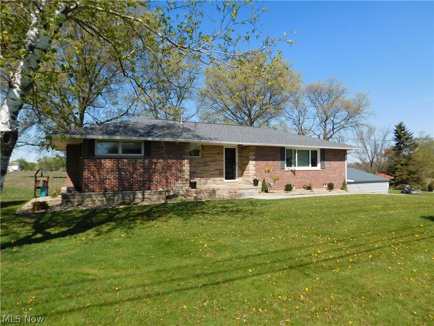 Completely remodeled 4 bedroom, 2 bathroom, brick ranch home on 2.85 scenic country acres. This beautifully renovated home is "like new", starting with the gourmet kitchen, new flooring, paint, woodwork, new HVAC system, updated bathrooms, new roof, addition in lower level, and much more!!!!! Offering over 2,400 square feet of living space, this house won't last long!  Smithville School District