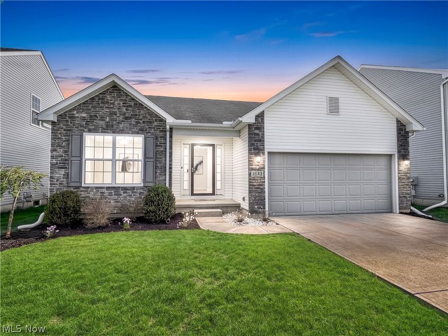 Welcome to this spectacular updated modern ranch with a full finished basement. Boasting 3,000 square feet of living space! 3 full baths!  Vaulted ceiling in great room thats open to the kitchen and dining area. Gorgeous white cabinetry with granite countertops, has bar top overhang. 1st floor laundry. Primary owners suite has trayed ceiling and private bath/walk-in shower and oversized walk-in closet. There are 2 additional bedrooms that share a private hallway off the main entry with full bath, tub/shower enclosure. The massive full basement is finished with a fantastic recreation room and private 4th bedroom with a 3rd full bath/walk-in shower enclosure. Everything is freshly appointed with modern grey interior wall paint and brand new carpeting. The rear deck off the sliding doors of the dining area overlooks a lovely yard. Lots of curb appeal with attractive stone front elevation and updated landscaping. This home shows like a newly built home, in mint turn key condition! Fabulous location near all amenities!