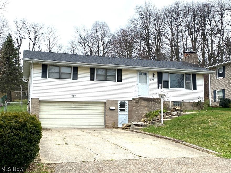 Welcome to 925 Field St NW!   This 3 bedroom raised ranch is centrally located in Plain Twp. on a cul-de-sac.  At the the front of the property  you will find a rock garden waterfall and rose garden. New carpet throughout installed 11/19 as well as freshly painted.  Updates include - Stainless  Range 12/19; Stainless Refrigerator 07/19; furnace 07/15; Hot Water Tank 05/14; 10 x 10 Shed new roof (plywood, tar paper, shingles) 10/20.  Lower level includes the 2nd wood burning fireplace as well as a 1/2 bath plumbed for a shower. Exterior includes patio off of kitchen; completely fenced in backyard; 24' round x 52" tall above ground swimming pool, 15,000 gallon capacity. Deck is 18' x 10' floating design. Re-leveled this past summer.  Liner, top seat coping and pump all replaced summer 2015.  New GFCI outlet installed 11/20.  Oversized 2-car garage includes shelving.  Schedule your showing today!