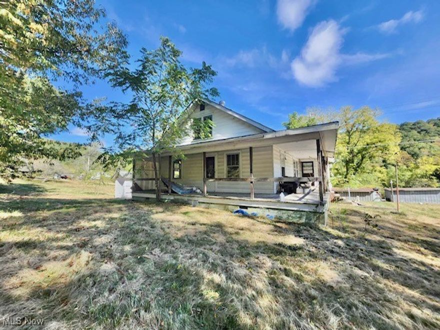 Discover the opportunity at 85 Winding Creek Road in Fayette County, WV! This four-bedroom, one-bath home sits on 1.5 acres and offers the chance to create the space you’ve always wanted. With two bedrooms on the main floor and two upstairs, there’s room to grow—plus the option to add a second full bath upstairs. The main floor also provides space for a convenient laundry area. A covered front porch is perfect for sitting with guests or enjoying your morning coffee, while the generous lot offers even more possibilities. This fixer-upper is ready for your vision to bring it to life.