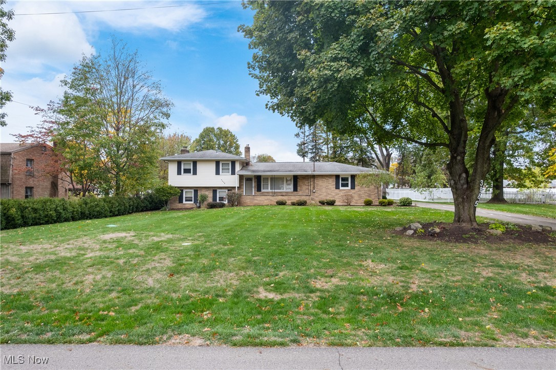 Welcome to this spacious four level split home located in desirable Lake School District.  The inviting abode offers four nicely sized bedrooms and two full baths.  On the main level, there is a large living with a wall of windows which offers tons of natural light.  The eat-in kitchen boasts dark oak cabinetry, corian countertops, and ceramic tile flooring.  Upstairs, there are three bedrooms and one full bathroom that has been recently updated.  Downstairs, there is a family room with a fireplace.  This is where the fourth bedroom and full bathroom are situated.  The basement offers tons of storage and a bonus room that could be used as an office or exercise room.  The backyard is fenced, which is perfect for pets.  All of this plus a two car attached garage.  This home has been well maintained and is awaiting a new owner.  Call to schedule a showing today.