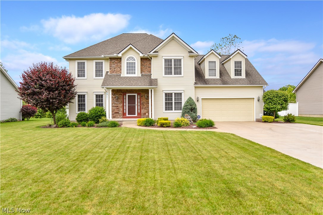 Don’t miss this rare opportunity for a 5 bedroom home in Canfield’s Preserve Development with access to Mill Creek Park bike path. Large 2 story foyer with split staircase and dual closets and 18" tile. Spacious great room with new carpet and gas fireplace which opens to eat in kitchen with center island. Large built-in corner pantry closet in kitchen. Formal dining room with trayed ceiling and new carpet. Convenient first floor laundry and ½ bath off garage. Sliding door from kitchen to beautiful stamped patio with Pergola and storage shed. 5 bedrooms upstairs including master suite and large master bath with double sink with new granite countertop and walk in closet. 4 other bedrooms (3 with walk-in closets) as well as large main bathroom offering double sinks and new granite countertop. Extra high 13 course basement already plumbed for full bath for even more living just waiting to be finished! 3 car wide concrete drive for hassle free parking.