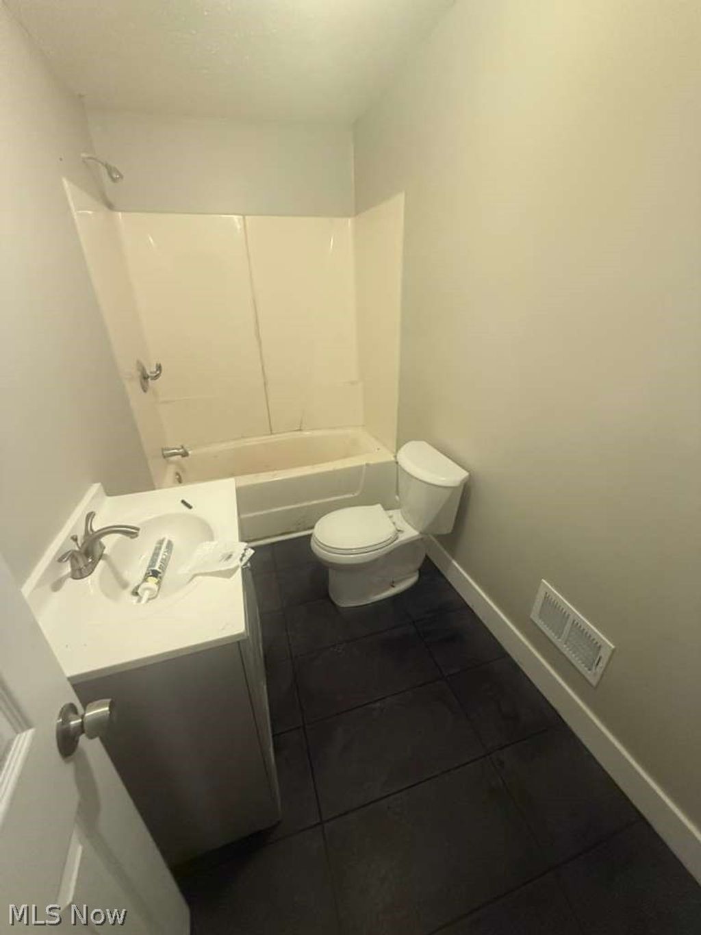 Photo of 14713 Pepper Avenue, Cleveland, OH 44110 (MLS # 5202611)