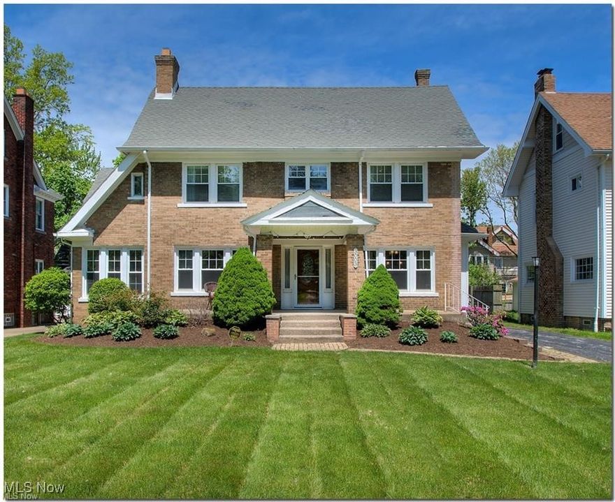 Welcome to this charming and traditional 4-bedroom, 3 full bath, 2 half bath home, perfectly situated in a vibrant Cleveland Heights neighborhood with access to four major entertainment districts—offering the best in dining, shopping, and nightlife just moments away. The front porch is designed for all-day enjoyment - featuring two sun-drenched seating areas and a shaded retreat for those hot summer days. It's the perfect place to sip your morning coffee or unwind in the evening. As you make your way inside, you'll see how this warm and inviting space was designed for both comfort and style. On the first floor, you'll find two living areas, one with a beautiful stone, wood-burning fireplace, as well as an additional family room or first floor office. The first floor also features a fabulously updated kitchen with granite counters, wood cabinetry, and high-end appliances. Upstairs, the primary suite features an ensuite bath, and two additional bedrooms with another full bath. On the third floor, you'll find the most perfect bedroom suite with tons versatility. All bedrooms have nice-size walk-in closets, giving you ample storage. In the cozy finished basement, you will find a half bath, recreational space (carpeted), the laundry room, and a storage area. This charming Cleveland Heights home will not last long - priced to sell! Call today to schedule your private tour. House is POS Compliant.