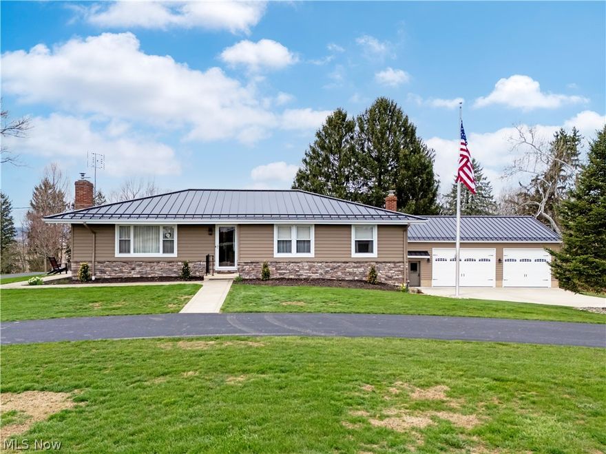 Welcome to your dream mini-farm in the desirable Triway School District! Situated on just under 4 acres, this beautifully renovated 3-bedroom, 2.5-bath home is the perfect blend of modern comfort and country charm—ideal for 4H families, hobby farmers, or anyone looking for space to live, work, and play.
Inside, you’ll find stunning wood floors, granite countertops, and two cozy woodburners that add warmth and character throughout the home. The spacious rec room features a wood stove and walkout access, making it a perfect spot for entertaining, relaxing, or creating additional living space. Enjoy peace of mind with a 2-year-old standing seam steel roof and extensive updates to both the home and outbuildings.
Outside is where this property truly shines. A heated one-car garage includes a convenient generator hookup. The impressive three-car garage is a standout feature with heated floors, a half bath, and a small lift—perfect for car enthusiasts, mechanics, or extra storage needs.
The barn is ready for your animals with two stalls, a feed room with sink, a loading dock, and gates that can remain with the property. The barn also features a standing seam steel roof approximately 5 years old. Seller is also willing to sell the fuel tank separately.
With room to roam and every major feature already updated, this one truly has it all. Don’t miss your opportunity to own this exceptional property!