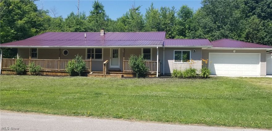3 Bedroom (2 bedrooms have closets), 1 Full Bath, 1st Floor Laundry, 2 Car Attached Garage, Double Lot. Newer: Metal Roof, Siding, Furnace, Hot Water Tank, Flooring, Paint and Covered Front Porch!
