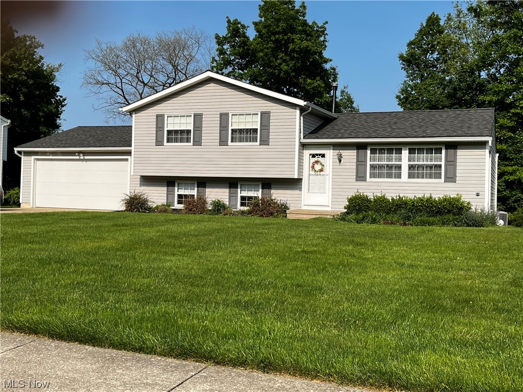 Welcome to this move-in ready home in River Park Estates that has been lovingly cared for by the present
owners. As you step in, you will appreciate the open floor plan, the natural light that flows throughout and the soft neutral colors that will enhance any furnishings. The living room is spacious and flows into the dining area with sliders out to the freshly painted deck, perfect for entertaining, your morning coffee or to relax after your busy day. The back yard is private and lined by trees in the rear. The kitchen featues all appliances, corian counter tops and sink, ample cabinet space with a pantry and ceramic tile flooring, The upstairs has 3 bedrooms and full bath with newer vanity, lighting, fixtures and a tub/shower. The spacious family room has space for a big screen TV, a wet bar and another full bath with step in shower. There are updated vinyl windows throughout. The partial basement is waterproofed, with newer furnace, central air and hot water tank. The wash