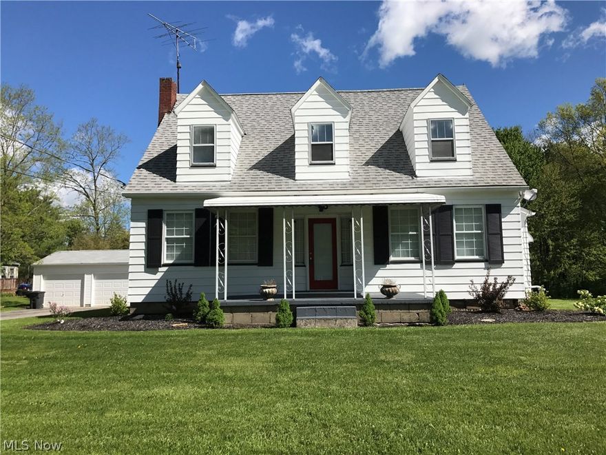 Totally remodeled 4 bedroom cape cod with 1 1/2 baths, gorgeous kitchen, spacious rooms, large deck, 2 1/2 car garage all on 5 acres.