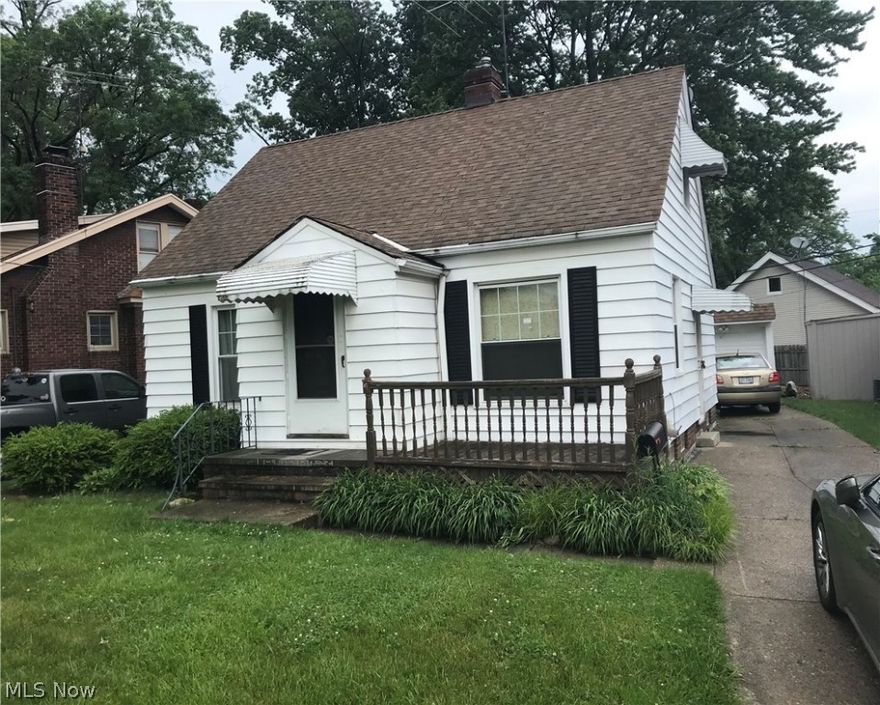 West Park Bungalow.   GREAT POTENTIAL !  Updated Electrical;  Hardwood Floors !  Well-designed with 2 Bedrooms Down; 1 Up;  Nice Basement.  Drive By and Call !