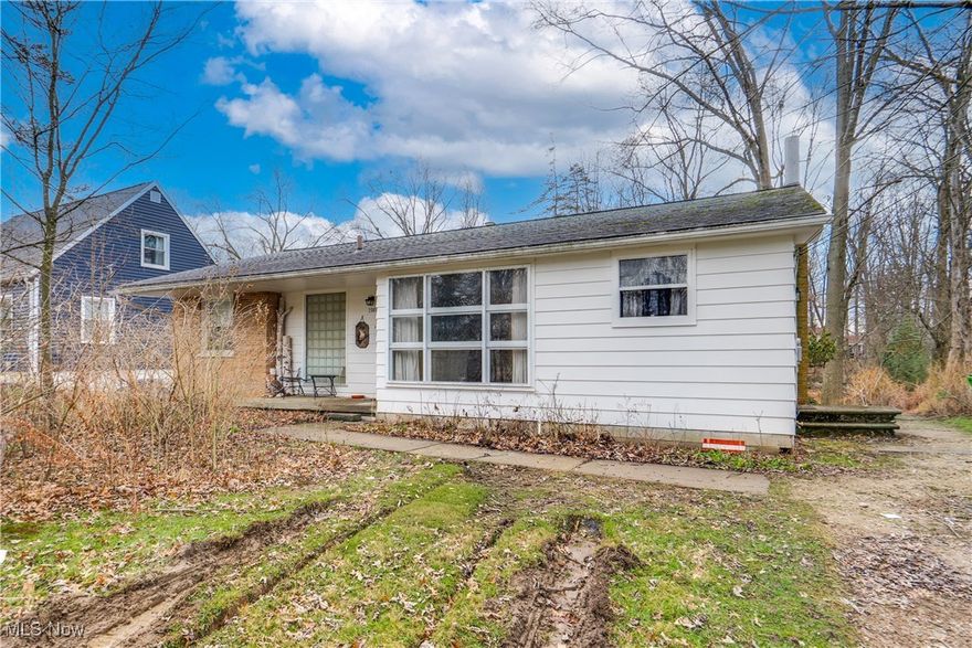 Opportunity knocks in Stow! This 3-bedroom, 1-bath ranch sits on a generous half-acre, tree-lined lot and offers endless potential for the right buyer. With solid bones and a functional layout, this home is ideal for an investor, flipper, or homeowner looking to build equity with a little sweat equity. Inside, you’ll find three well-sized bedrooms and a partially finished basement that adds valuable bonus space—perfect for a rec room, home office, or future expansion. This space is also plumbed and ready for a second bathroom, adding even more value. You'll appreciate the large windows in both the dining and living room along with multiple fireplaces on the first and lower level. The home does need updates both inside and out, but the setting and layout provide a strong foundation to make it your own. Outside, enjoy the privacy and charm of the mature trees and expansive yard, offering room for outdoor entertaining, gardening, or future improvements. Conveniently located near parks, shopping, dining, and major routes, this property combines location, lot size, and potential—a rare find at this price point. Bring your vision and unlock the possibilities—whether you’re looking to renovate and resell or create a personalized place to call home. Being sold as is.