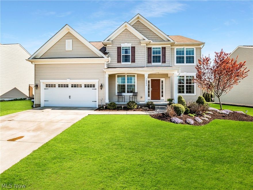 Welcome to this stunning colonial with a great open floor plan! Upon entry, you're met in the foyer with hardwood floors wood floors and a large staircase to the upstairs. There is a formal living room and a large dining room which is great for entertaining. The large open concept floor plan goes from the kitchen to the family room with a vaulted ceiling and fireplace. The large kitchen with custom cabinets, granite counters, center island, dinette area with a sliding door leading to the beautifully stamped patio. The spacious owner's suite has a vaulted ceiling, a glamour bath, and a large soaking tub. It is finished with double sinks and a custom shower. There are also 3 additional bedrooms upstairs and a large 20'x15' bonus room. Echo Lake is a stunning community in Strongsville that offers amenities such as a pool, clubhouse, tennis courts, and playground.