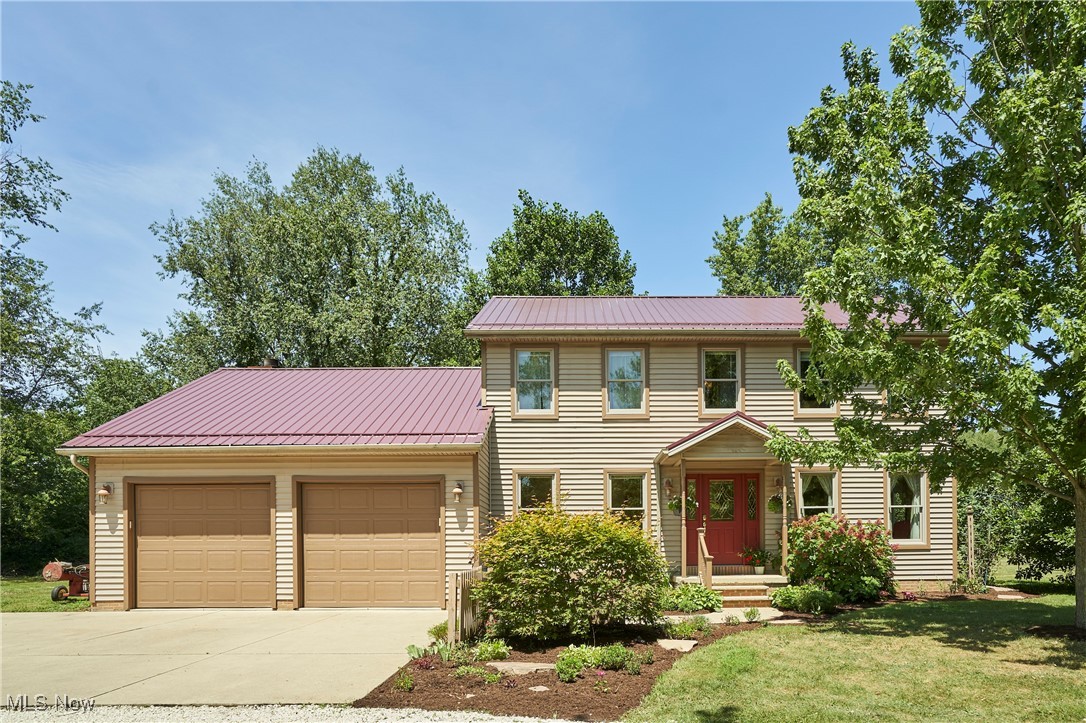 Welcome to this charming, one-owner Colonial-style home in beautiful Wadsworth, located on a spacious 15.54-acre, 2-parcel lot—3.21 acres w/house & an additional 12.33-acres. This home offers 4 BDs and 3 full BA across 2,412 sf of above-grade living space, providing plenty of room for both everyday comfort and entertaining. The spacious main level features a large eat-in kitchen with oak cabinetry, granite countertops, and recessed lighting. The kitchen opens to a sunken family room with vaulted ceilings and direct access to the covered back patio and backyard. Additional main-level highlights include formal dining and living rooms, a convenient laundry area, a home office, and a full bathroom. Upstairs, the spacious primary bedroom features an en suite bath complete with a soaking tub, walk-in shower, and dual vanities. Three additional generously sized BDs and a shared full BA complete the second level. This home also offers an attached 2-car garage. The expansive property features a deck with a pergola and direct access to the hot tub just off the dining room, along with a stamped concrete patio, mostly covered by an awning—ideal for outdoor entertaining. A highlight of the property is the spacious two-story barn (48’ x 36’) equipped with 100 amp service. The main level offers 12-foot side walls, two garage doors—one at the front (9' x 8') and one at the rear (9' x 10')—a heated full bathroom, and a 48' x 8' lean-to covered patio. Upstairs includes a full kitchen, full bathroom, and a bedroom, all heated by electric baseboard. Just behind the barn, you’ll find a fenced pasture and mini barn (24’ x 16’), with additional open acreage—perfect for animals, gardening, or recreation. Updates include Metal Roof (2018) and Windows (2005). The 12+ acre parcel is contiguous to a stubbed street at the end of Newton Drive in the Westchester Development- Could be subdivided. Don’t miss your chance to own this beautiful, one-of-a-kind property! Schedule your showing today!