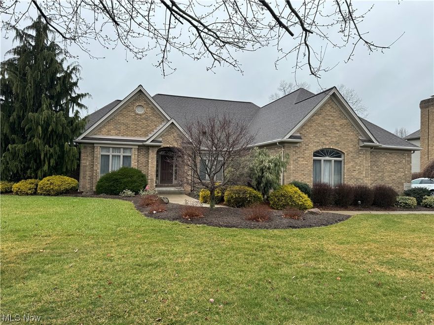 Welcome to your dream home nestled in one of Howland's most coveted locations! This stunning custom-built brick ranch sits gracefully on a serene cul-de-sac, offering the perfect blend of elegance and comfort. As you step inside, you're greeted by an open and airy ambiance, accentuated by the impeccable flow of the home's design. The formal dining room boasts exquisite tray ceilings, setting the stage for memorable gatherings and intimate dinners. Unwind in the inviting family room, complete with a charming brick gas fireplace that exudes warmth and character. The spacious eat-in kitchen is a chef's delight, featuring a convenient breakfast bar, built-in desk, double convection oven, and ample cabinetry. Retreat to the luxurious master bedroom retreat, where his and her walk-in closets provide ample storage space. The master bathroom offers a tranquil oasis, boasting a relaxing garden tub, separate shower, and a built-in vanity for added convenience. Step outside to the serene patio area, perfect for soaking in the picturesque surroundings. The first-floor laundry adds practicality to daily living, while the oversized attached 3-car garage offers plenty of space for your vehicles and storage needs. Entertainment knows no bounds in the expansive rec room, complete with a convenient kitchenette and a plethora of recreational amenities including a pool table, air hockey table, and ping pong table—making it the ultimate haven for gatherings and leisure. This home is not only beautiful but also practical, with a new roof installed in July of 2023, and a new furnace and air system in 2019. Enjoy the convenience and peace of mind provided by the yard sprinkler system and security system. Experience true luxury living in this one-of-a-kind residence—a true must-see that promises to exceed all expectations. Welcome home!