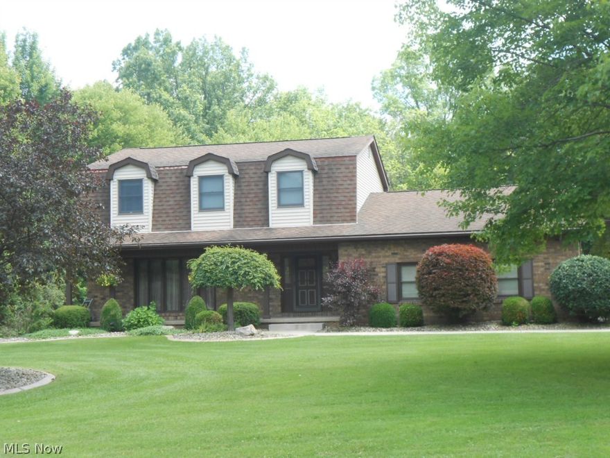 Looking for the perfect spot? Situated on 8.75 wooded acres with an additional 24 x 40 (4 car) heated & insulated garage, tranquil pond (13 ft deep) with spray fountain, pavilion with attached storage unit and an additional shed, this property has it all!  Numerous improvements include a new 200 ft well (2013), new furn (2011), new Andersen windows (upstairs only) & patio door (2005), new A/C (2005), new stainless steel refrigerator, stove & microwave (2013), Corian Kit counter tops (10 yrs), laminate flooring (6 yrs) in the Kit, DR, laundry & hallway, roof was replaced (tear-off) 1998, sun filled 3 season room with ventless heater & sliding doors to a deck and beautifully landscaped patio for entertaining.  Seize the moment and don't let this one pass you by! Call for your private showing and particulars.