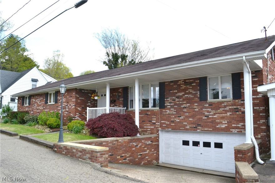 RAMBLING RANCH WITH SO MUCH TO OFFER!  Significant space is yours in this 3 bedroom, 2 bath brick ranch home in Wellsburg.  Truly a must see, this home features a fabulous family room with gleaming hardwood flooring and grand stone fireplace for warmth and comfort that flows into a beautiful, fully equipped kitchen with breakfast bar.  Offers a living room, dining room, master bath, finished recreation room in the lower level that could be a 4th bedroom and an expansive loft area overlooking the great room spanning the length of the house.  Entertain outdoors with your own slice of paradise that include a patio with relaxing hot tub and refreshing in ground pool complete with pool house and 1/2 bath.  2 car garage, central air and so much more!