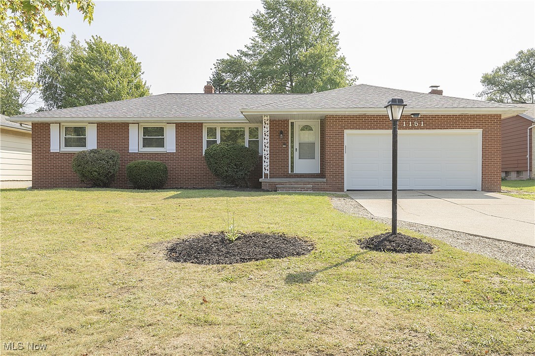 Can you say WOW? This beautiful brick ranch's interior has been remodeled from top to bottom! New flooring throughout, fresh paint, baseboard and interior doors. Completely remodeled kitchen with new cabinets, pantry, stainless appliances and stone counter tops. Check out the kitchen sink. Walk out basement. Remodeled two full baths. Newer light fixtures. Beautiful tile work in the kitchen and both baths. New ceiling fans in the bedrooms. Glass block windows. Roof is 6 years old.