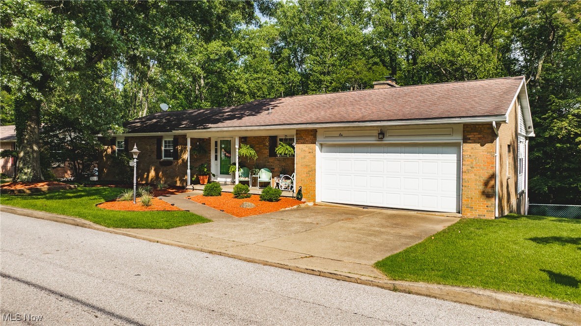 Welcome to this well-maintained brick ranch offering a perfect blend of space, functionality, and comfort in a superb, convenient location. Inside, you'll find a nicely flowing floor plan featuring a beautifully updated kitchen with modern cabinetry, counters, and tile flooring. A formal dining room provides the perfect space for gatherings, while the enclosed back porch makes an ideal gathering room, home office, or den, flexible enough to suit your lifestyle.
The partially finished walkout basement includes a large rec room with a cozy fireplace, a spacious 4th bedroom, and an abundance of storage space in the unfinished areas, complete with laundry hookups. Outside, enjoy the private backyard, perfect for relaxing or entertaining, and a concrete storage area under the garage with a separate entrance — ideal for lawn equipment, tools, or hobby space.
With spacious rooms throughout, thoughtful updates, and multiple living zones, this brick ranch is move-in ready and offers all the comfort and space you’ve been looking for.
