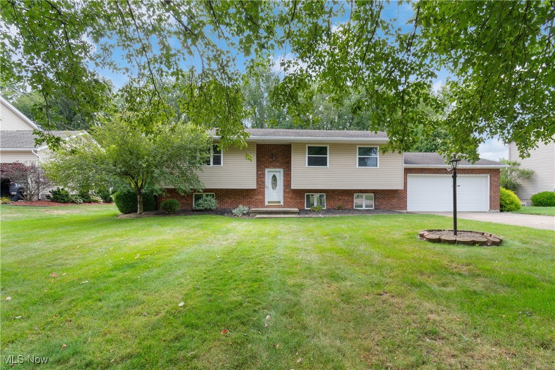 Welcome to this well-maintained 3 bedroom, 3 full bath bi-level home located in the desirable Green Local School District in Uniontown. This move-in ready home features a spacious layout with a finished lower level that includes a bar area, perfect for entertaining. Recent updates include a new hot water tank (2022), new pressure tank (2024), and a professionally waterproofed basement offering added peace of mind. Step outside to a low-maintenance composite deck overlooking a private backyard, ideal for relaxing or hosting guests. Additional highlights include an attached garage, quiet neighborhood setting, and convenient access to schools, shopping, and highways. This home combines comfort, functionality, and location—schedule your showing today!