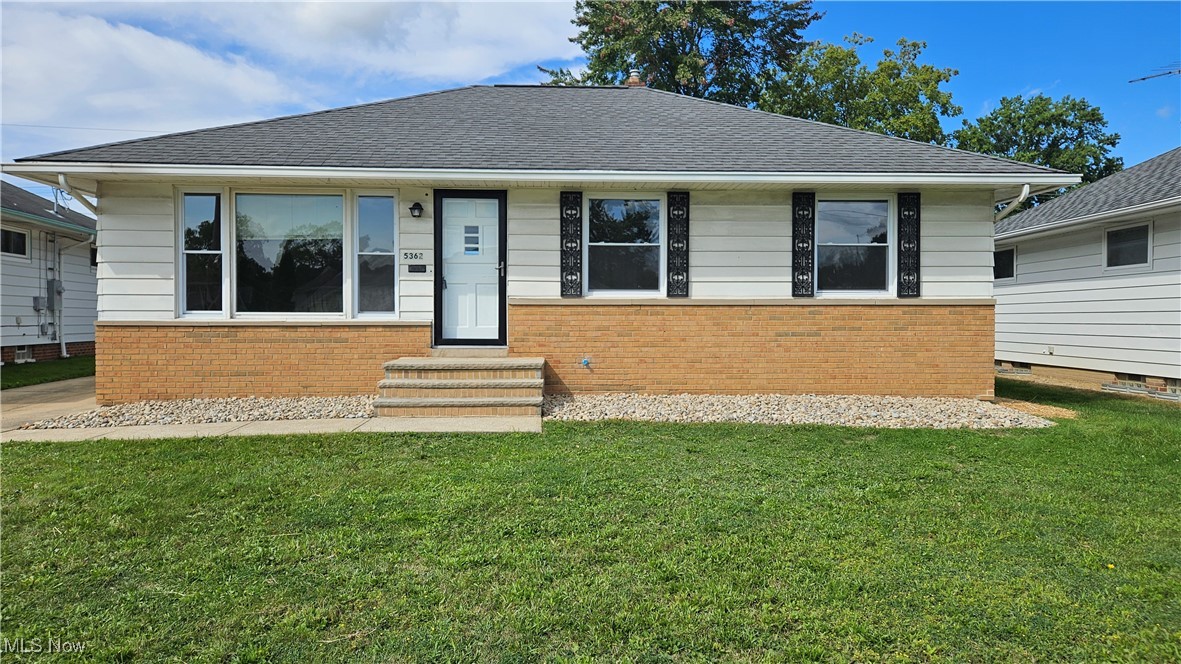 Easy one-floor living in this charming Garfield Hts ranch! Features newer carpet and paint throughout and a light-filled living room that welcomes you as you enter. The living room opens to a refreshed kitchen and dining area with stylish wood laminate flooring. The kitchen boasts newer countertops, backsplash, and stainless steel appliances. The main level includes three bedrooms and a full bathroom. The lower level offers a second full bath, a spacious recreation room, and a versatile bonus room—perfect for an office, 4th bedroom, playroom, or workout space. Plenty of storage can be found in the lower level. Additional highlights include a detached two-car garage and a nice backyard—ideal for outdoor fun. Move-in ready and waiting for you!