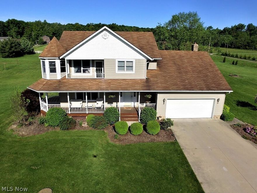 NEW PRICE! What an Amazing Well Built 1 Owner Property in Mespotamia Township located on 17.5 scenic acres. Wooded back property with running creek and ravine.  No zoning makes this property so appealing offering so much potential! Country Farm or at home business?  This beautiful home offers over 2,ooo  sq. ft. of living space. 3 bedrooms, 2.5 baths, full basement and  2 car attached garage.  Lovely open eat-in kitchen/island including all newer appliances. Formal dining room and spacious living room.  Fabulous family room with a stone fireplace/wood burner.  Beautiful master suite with a quaint sitting area in the turret with lots of windows for natural sunlight.  Well built 2 story barn (32 x 48) with  (10 x 48) canopy attached. Barn includes tack room & wash bay on concrete floors horse stalls have dirt floors -electric and water. Huge 80 x 55 Outbuilding for multiple purpose use. Concrete floor, insulated, heated, water and electric.  Four 14' overhead doors.  Also has its own sep