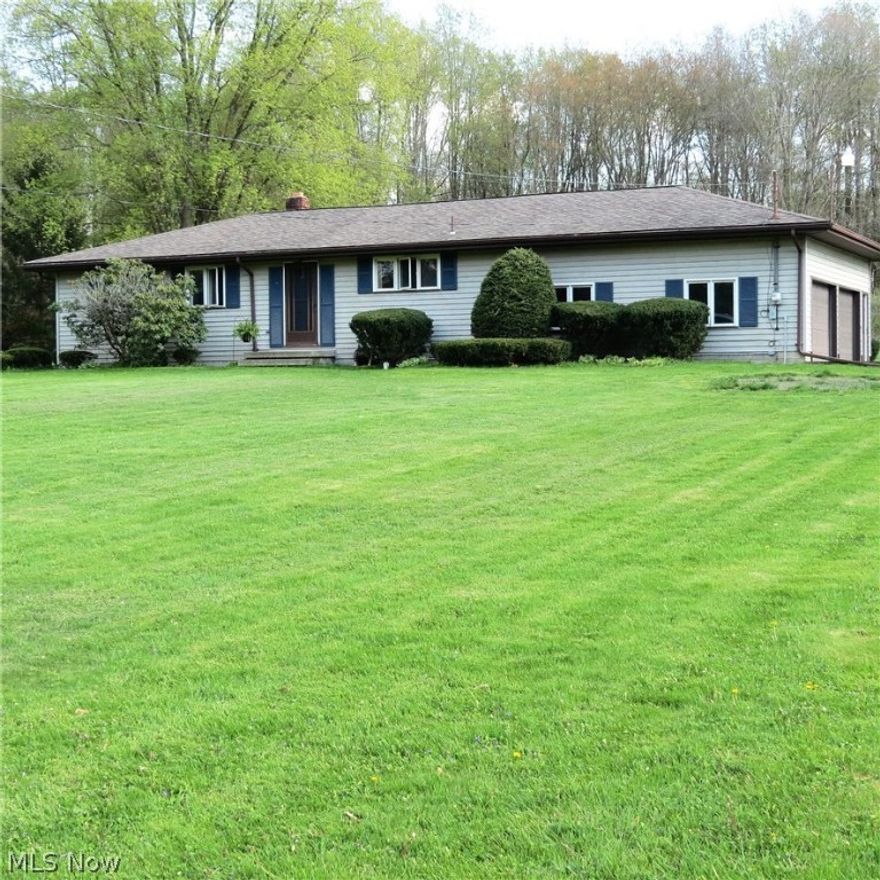 Looking for quiet country living??? Don't miss this great 3 bedroom, 2 bath ranch with 4 car garage (2 attached, heated, 2 detached). Situated on 2.83 peaceful acres with room for lots of outdoor activities, gardening, or a realxing walk through the woods. This home has been beautifully updated in neutral decor. Lovely, light living room features a vaulted ceiling and French doors that exit to the large enclosed patio where you can watch nature play in the expansive backyard & woods. Eat-in kitchen has plenty of wood cabinetry, large pantry & all appliances. Bedrooms have nice hardwood floors & good closet space. Main bath has been renovated.  Second full bath & huge recreation room on the lower level is perfect for those indoor parties, could be used as a playroom, teen suite, hobby room, "man cave" or whatever your mind can create. The basement has been waterproofed and has stairs that also exit to the attached garage. Additional updates include newer water heater, sump pump, well ho