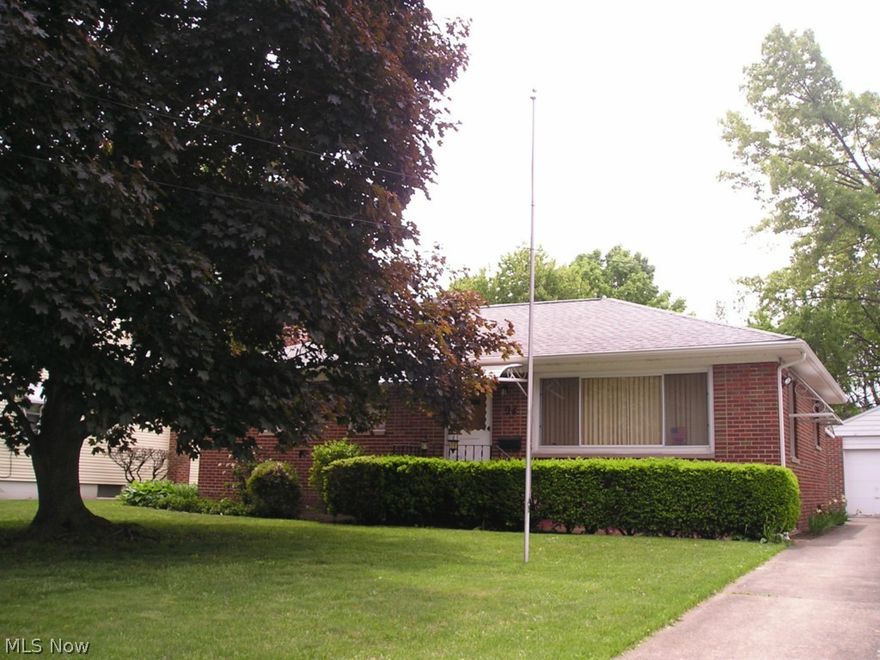 You will appreciate the immaculate condition of this lovely Brick Ranch located on a very nice landscaped lot.  The large living room & three bedrooms have beautiful hardwood floors & newer vinyl windows.  The Bedrooms have ceiling & closet lights.  Ceilings were painted in 2015.  The Bathroom has ceramic floor.  The spacious kitchen & dining area offer Refrigerator (2013), Counter-Top Range & Oven (2007), Dishwasher, Disposal.  The lower level kitchen cabinets have pull-out shelves for easy access.  The large divided basement has glass block windows, laundry tub, waterproofed, and updated electric box.  Move-in condition.  Garage with Door Opener.  Convenient Location.  A Must See!