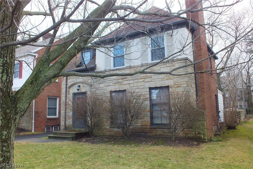 *Sold As-Is*  Fabulous opportunity to be in a sought after area of University Heights close to shopping, John Carroll University & GESU. Pretty brick and stone Colonial has first floor family room on first floor & previously updated Eat-in Kitchen.  Hardwood floors, central A/C,  Some newer windows, roof 2001, garage roof 2003, finished lower level rec room. Easy to show, terrific opportunity, needs some love & buyer will need to assume the City of University Hts POS violations. Motivated seller wants it SOLD but will not make any repairs.