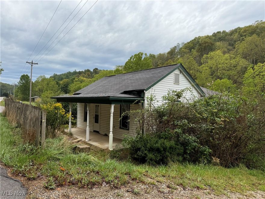 Highly sought after hunting property in the beautiful rolling hills of Monroe County, which also borders Wayne National Forest. It is just a few minutes from the beautiful Ohio River, for those boating and fishing enthusiasts.   The property has two houses, one of them has been updated and the other one is a fixer upper.  There is also a barn and other buildings that would need restored.  It is in a rural area, but only 20-25 minutes from the local grocery stores, shopping, banking, the county seat, and only 5 minutes from the community/senior center.  It is located conveniently along State Route 800.