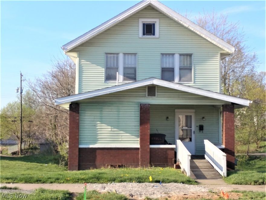 Affordable home with three bedrooms, two baths, with an additional lot. Convenient location close to downtown.