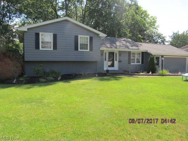 Great location near Grade, Middle and High Schools, walk to shopping and restaurants, roof shingles replaced 2016,exterior painted June 2017, lower level bath updated, rec room/ family room newly updated,French doors lead to patio and partialy fenced rear yard, some new plantings and mulch, eatin kitchen plus dining room, living room with vaulted beamed ceiling, large laundry room with plenty of cupard space and built in ironing board
