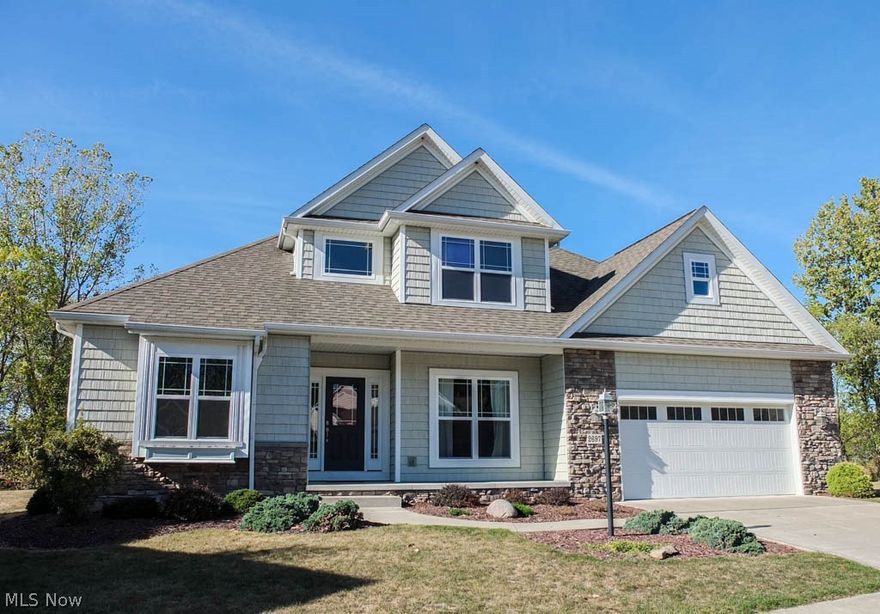 Gorgeous 4 bedroom, 3.5 bath home with a first floor master and finished lower level in Jackson! Impressive two story foyer opens to the dining room with beautiful columns. The kitchen has stainless steel appliances, a breakfast bar and dinette, a pantry, a built-in desk and is open to the stunning 2-story great room featuring a fireplace. Beautiful doors and hardware throughout - high ceilings on the main level! The formal living room could also be used as a great office. Convenient half bath on the main level. First floor master suite with a walk-in closet and a private full bath. The walk-in closet even has an additional laundry hookup! You won't mind waking up in the morning when you're getting ready in this sun-filled master bath with dual sinks, a walk-in shower and a large garden tub! Upstairs, there are 3 bedrooms - all generously sized - a large full bath, a loft overlooking the great room and second floor laundry for easy clothing transport! Amazing finished lower level will