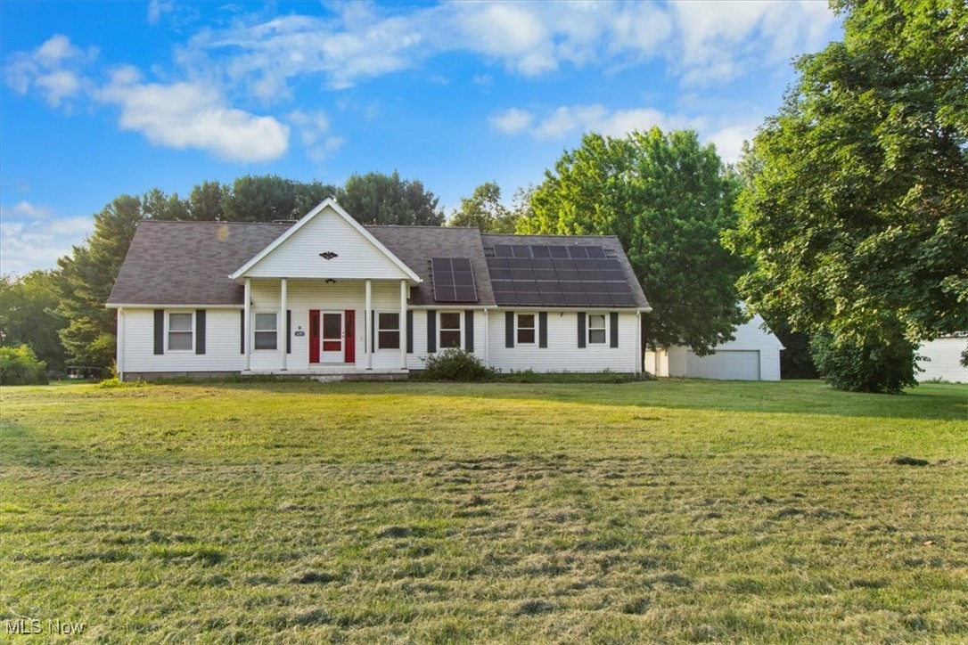 As summer fades, picture yourself in this charming colonial at 14307 Mason Rd. Vermilion, Ohio, set on a sprawling 2-acre lot just 10 minutes from the tranquil waters of Lake Erie. This inviting 4-bedroom home, a short trip from downtown Vermilion, features two main-floor bedrooms and two upstairs, perfect for family or guests. Fresh updates include new carpet, freshly painted main-floor bedrooms and basement, and new tub surrounds, creating a warm, welcoming vibe. Energy-efficient solar panels installed in 2020 help slash utility costs, making this home as practical as it is charming. A detached garage with in-law suite potential and an attached garage add versatility and ease. The spacious finished basement offers a versatile space for a home theater or family retreat. With 2 acres for late-summer enjoyment and Lake Erie nearby, this Vermilion gem feels like home. Schedule a showing today to embrace the warmth and charm of this inviting retreat!