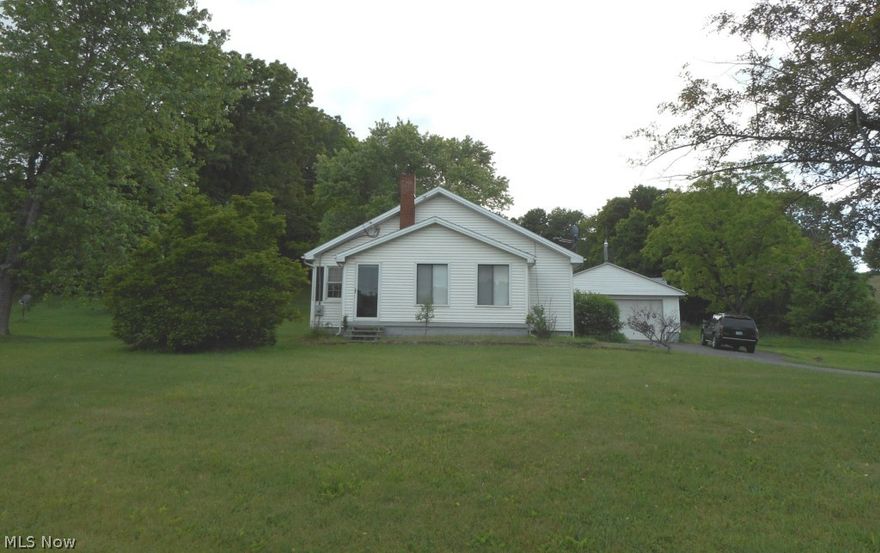 Situated on over 12 acres with 3 parcels in Wayne Township, this 3 bedroom ranch features oil, hot water heat and electric heat pump system, central air, a newer addition with 15X25 Family Room with heated floor and exterior amenities including a 2 1/2 car garage, pole barn building and shed.  Gas and mineral rights do not transfer with the sale.