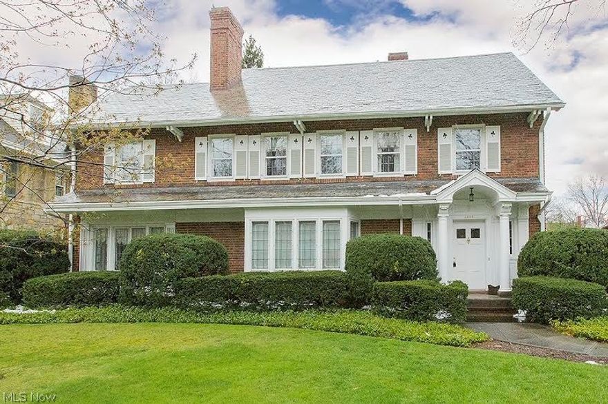 All brick colonial on one of Cleveland Heights' most beautiful streets off historic Fairmount Boulevard. Beautiful architectural details throughout, including hardwood floors throughout. First floor has spacious, bright eat-in kitchen, inviting living room, formal dining room and sunny family room. Five bedrooms and 3 full baths on second floor. Full third floor offers lots of storage, or an opportunity to enlarge the home. Beautifully landscaped mature yard with cozy back porches. Newer concrete driveway and updated 2-car brick garage. Outstanding location with great commute to hospitals, universities and University Circle, Cleveland's cultural hub. From this location, you can enjoy all Cleveland Heights has to offer with entertainment, restaurants and shopping. Kitchen has central air. This lovely home has been beautifully maintained and cared for. It's ready to move into!