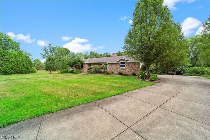 Welcome to this beautifully appointed ranch home, nestled in a tranquil cul-de-sac and offering over an acre of private, serene living. The exterior features stunning stonework, a spacious front porch, and a side-load garage, enhancing both curb appeal and functionality.

Step inside to a modern haven with numerous recent upgrades. The newer windows, installed in 2020, enhance energy efficiency. The eat-in kitchen, renovated in 2020, boasts contemporary finishes and seamlessly flows with the LVT flooring that extends throughout the home. The main bathroom has been tastefully remodeled in 2024.

The large laundry room provides ample storage space for added convenience. The walk-out basement is a versatile area perfect for both relaxation and entertainment. Enjoy movie nights by the fireplace or host gatherings in the entertainment area, complete with a wetbar. Additionally, a full-wall aquarium adds a unique touch, while the finished basement area offers space for a workout zone with finished drywall and an extra storage closet, providing endless possibilities.

Step outside to a private retreat with a beautifully landscaped yard, featuring a tranquil koi pond. The large storage shed with a loft offers additional functionality and storage options.

This home beautifully combines modern comfort with serene outdoor living, making it a perfect place to call your own. Don?t miss out on this exceptional opportunity!