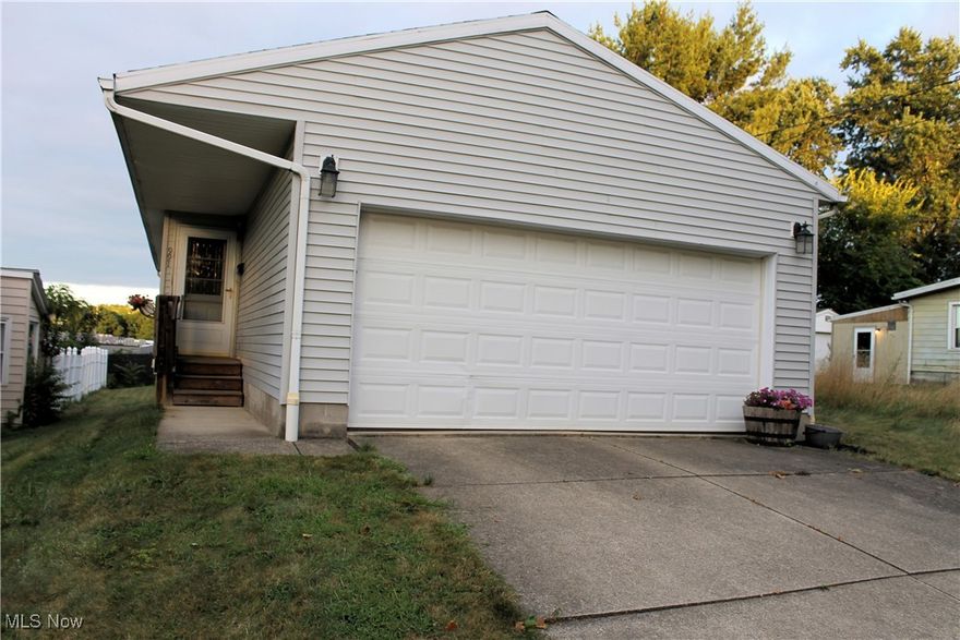 If you're looking for a move in ready home, here it is! Offering 3 bedrooms, 2 full bath's, a roomy eat-in kitchen with all the appliances, a comfy living room with cathedral ceilings and newer flooring and paint throughout the entire first floor. There is a full basement for lots of storage and a 2 car garage. Out back is a nice open yard that could easily be fenced. All this was built in 2004, one owner, and offers 960 SF. Call your favorite Realtor today and make an appointment to see this nice home.