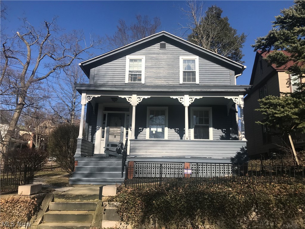 CLASSIC COLONIAL ~ one block West of the historic district. Large rooms, winding staircase and even a fenced front yard. Newer gas furnace. Lots of updates needed. Priced right for condition.