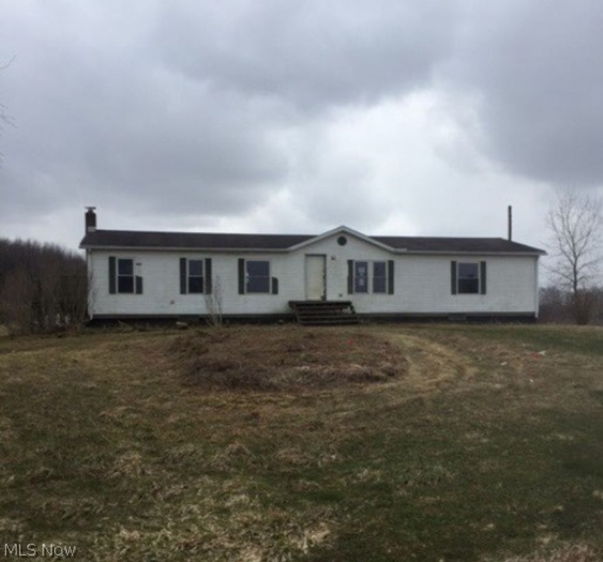 Approximately 6.46 acres to create your own oasis! Rare opportunity available for the right buyer. Home features: +/-1,782 SF, 3 bedrooms, 2 baths and unfinished basement. Property is a rehab. Come see what you can do to with this great piece of property and land. Make an offer today.