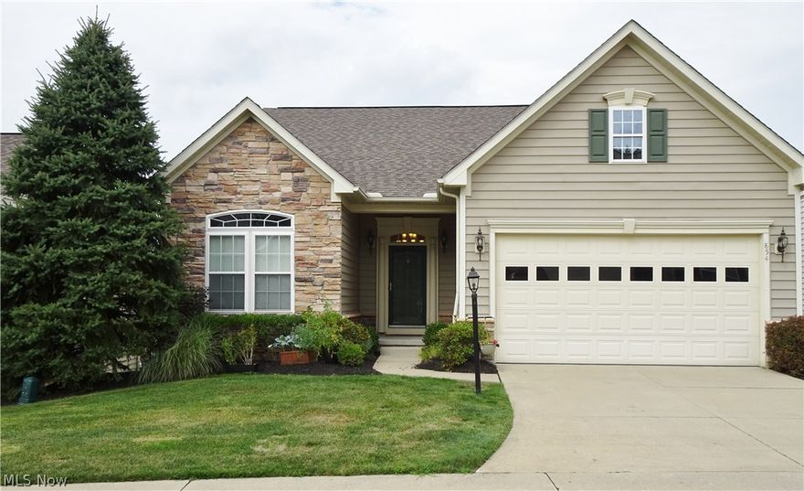 Immaculate ranch home with a desirable open and flowing floor plan. Lovely 2 story entry with hardwood floor. Vaulted great room offers plenty of natural light with one full wall of windows, and opens to the vaulted kitchen and dining rooms. Kitchen features granite counters, 2-tier center island, pantry, newer stainless steel appliances and back splash-2016. A slider leads to the 5 yr old deck, also stained 2016. Very spacious master suite with a tray ceiling and walk-in closet. Master bath with double sink vanity, separate shower & garden tub and ceramic floor. Bedroom #2 also has a vaulted ceiling and circle top window. Bedroom #3 has a walk-in closet. The lower level finished walk-out also features the same wall of windows and slider, and adds 600 sq ft (+-) of additional living space. Plumbed for a 1/2 bathroom. The unfinished basement storage area adds another 700 sq ft (+-). First floor laundry room, off the 2 car garage, with ceramic floor and shelving. This entire home has bee