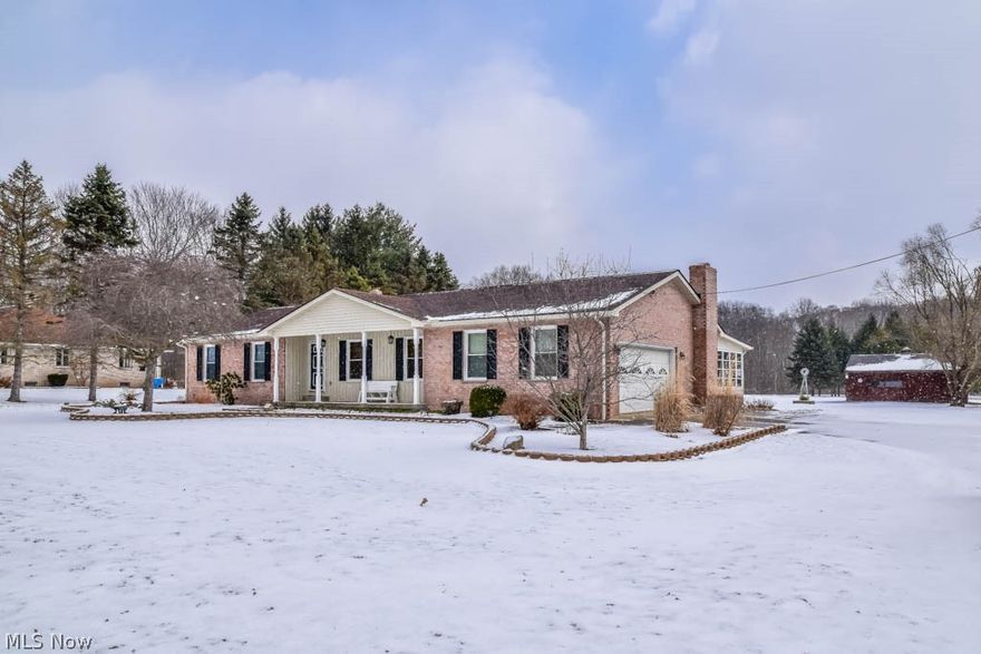 Beautiful 3 bedroom, 3 full bath ranch on 4.4 acres in a gorgeous, private country setting! Pushed far off the road with cleared, flat acreage in the backyard providing picturesque views! Inside, this home offers expansive living areas with large windows to let the sunshine in. The 19x12 living room features brand new carpet while the family room boasts a lovely brick fireplace. Crack open your cookbook in the fully applianced eat-in kitchen with updated hickory cabinets, solid surface countertops, a breakfast bar, built-in hutch, a dinette, pantry and French doors to the back deck. Down the hall, there are 3 bedrooms and a remodeled full bath with tile flooring and shower surround. The master suite has an updated private full bath. The finished, walkout lower level has been waterproofed with a lifetime transferable warranty. Finished areas include a rec room with a wood burning stove, bonus room with foam tile flooring and a possible fourth bedroom with a private full bath. Enjoy acre